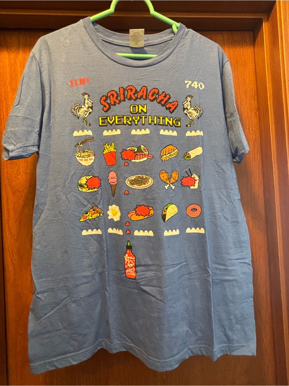 Ripple Junction Blue Graphic Tee with Orange Label Accents